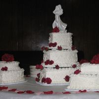 Hearts & Scrolls I didn't get to see the topper until I took the cake to set it up. The topper was so heavy that I wasn't sure how to put it on...