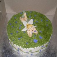 Tinkerbell A thinkbell cake made for a client's daughter. I doctored a box mix for this cake as the girl desperately wanted a rainbow chip cake....