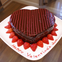 2Nd Valentine's Day Cake Chocolate Cake filled with Chocolate Fudge and covered in Chocolate Glaze and Strawberries