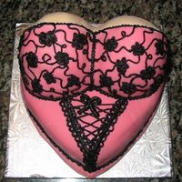 Lingerie Cake A scaled-down version o the lingerie/boob cake. I used a 6-in heart pan and 2 Wilton mini wondermolds. Props to all the boob cake bakers...