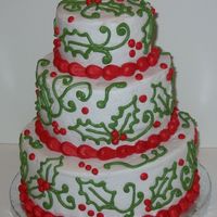 Holly And Swirls Freehand holly leaves and swirls in buttercream.