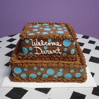 Brown & Blue Baby Shower Chocolate & white cake with chocolate buttercream. Dots are fondant.