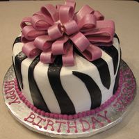 Happy Birthday All buttercream, with fondant bow and fondant zebra accents. This was one happy birthday girl!