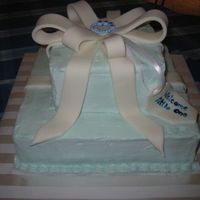 Baby Shower Present This was a pineapple cake with cream cheese frosting accented with fondant.