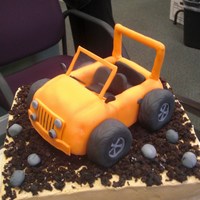 Jeep Cake The bottom was a sheet cae covered in buttercream and crumbled chocolate muffin. The Jeep was molded from rice crispies treats, frosted...