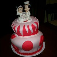 Mickey And Minnie For a bride and groom goin to Disneyland for their honeymoon.