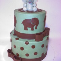Elephant Baby Shower Cake Cake for a baby shower with elephant theme, their colors were chocolate brown and sage. Buttercream with fondant details, the elephant on...
