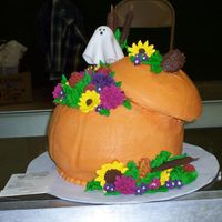 Fall Harvest Pumpkin Bouquet Thanks to sue_dye for the inspiration for this one. I entered this into our local fair today. Three 8 inch layers with shaved 6 inch layer...