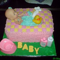 Baby Shower I made this cake for a friend's baby shower. It is a chocolate cakewith butter icing, the tiles on the bath are made from plastic...