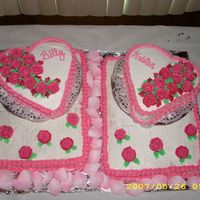 Wedding Shower These cakes took three people to make. We used two sheet cakes for the bases and two 9in round cakes for the hearts. We cut the round cakes...