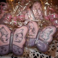 001.jpg These are cinamon sugar cookies covered in royal icing. I made them to give out as favors for a babyshower.