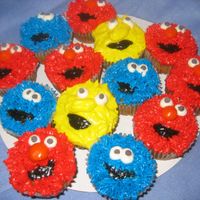 Sesame_Character_Cupcakes.jpg My first attempt at Sesame Street Character Cupcakes. Saw another CCer's and thought I'd give them a try. Hope you don't...