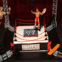 Wwe Birthday Cake The ring is a two layer square cake with fondant...I purchased the edible logo online. The wrestling accessories really finished off the...