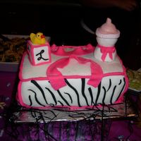Zebra Print Diaper Bag Cake Zebra print diaper bag with baby bottle and baby block with yellow duck.I made this cake for my daughter's baby shower. We have...