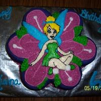 Tinkerbell 2 Layers from the Flower Pan, Frosted in Buttercream freehand to match invitations.