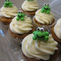 Frog Cupcakes Made for a friend who just had a baby. The baby's room has a frog theme so I did my best to make little frogs!