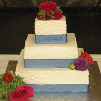 White Buttercream Wedding Cake. 