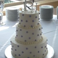 White Buttercream With Purple Dots 