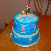 Ariel Little Mermaid Birthday Cake Ariel birthday cake. Buttercream with Disney figures and sugar shells and sealife from Partyworks. Thanks to tyty for the inspiration and...