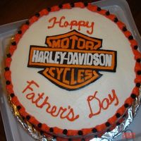 Harley Cake Red Velvet with cream cheese icing...Harley emblem is done in fondant.