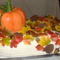 Autumn Leaves And Pumpkin Okay, I have to admit: I am SO proud of this one! It's hazelnut, hazelnut, with more hazelnut. The filling is a whipped ganache milk...