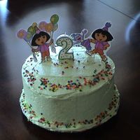 Dsc00938.jpg One of the Dora cakes for my twins 2nd birthday. One was chocolate with chocolate hazelnut mousse filling and vanilla with raspberry mousse...