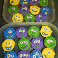 Monster Cupcakes Saw an idea for these here, thanks so much. The kids at my son's school loved these. MMF faces, vanilla cupcakes with purple jello...