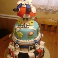 Gaming Themed Bar Mitzvah Cake Customers invitation was an assortment of mario, poker chips, dice, foos ball and monopoly. The poker chip has a removable USB so all was...