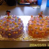 Dora The Explorer Cake This is a piucture of the cakes I mad for my GodDaughters 5th birthday. I made it with two white cakes mixes, (four 9" round cakes)...