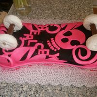 Skateboard Cake My daughters 12th birthday cake. I made the black fondant out of chocolate fondant and then used the wilton black spray. The hot pink is...