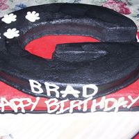 Georgia Fan A true Georgia Bulldog Fan with a set of paws. Happy Birthday Brad in white chocolate..