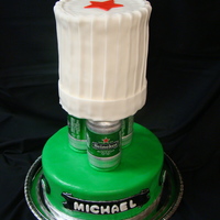 Heineken Toque A chef's toque atop heineken cans