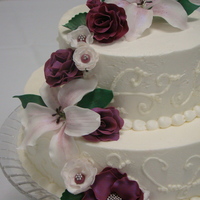 Nichole hand made gumpaste flowers in shades of purple.