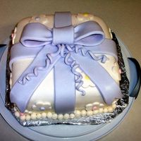 First Fondant Cake First fondant cake made for wilton course 3, made with MFF.