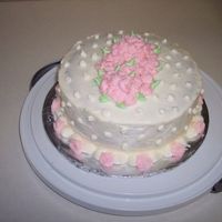 Wilton 1 Course - Final Cake Here is my final cake from my wilton 1 Course. It was butter pecan with Almond flavoored Icing and crushed pecans in the center. There was...