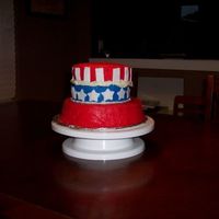 Uncle Sam Hat Lots of firsts here... 1st stacked cake(two 6in & two 9in pans) 1st time decorating with cream cheese icing (it got really dry and...