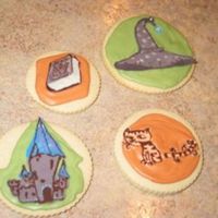 Castle, Spell Book, Wizard Hat, And Cat Cookies I made these cookies based on the book, "The Wizard, The Ugly, and The Book of Shame" for a birthday gift. I thought it was a...