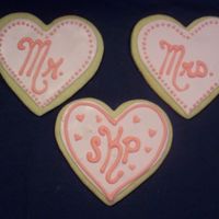 Wedding Themed Hearts sugar cookies and royal icing- my sister wants some version of this at her wedding so I'm trying out some different designs until she...