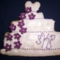 Wedding Cake Cookie sugar cookie with royal icing and fondant cut-out flowers