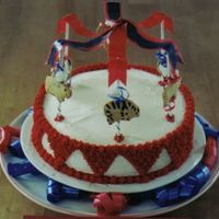 Carousel Cake I was pressed for time, so I used animal crackers and embellished them with black decorating gel. For the streamers I used "Fruit-by-...