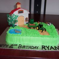 Farm Birthday Cake I made this cake for my cousin's little boy who was turning two. Her son is infatuated with farms, John Deere tractors and holstein...