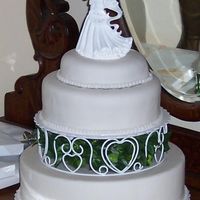 Simple Yet Elegant Wedding Cake I made this cake for my wedding which was an intimate affair of 15 people. We were striving for a simple and elegant theme. The bottom...