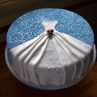 Brides Dress WASC cake with raspberry mousse and almond buttercream. Fondant dress. Inspiration from several cakes here on CC.