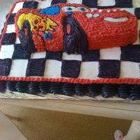 Lightning Mcqueen Cakes are from basic 1-2-3-4 recipe. Car was done in Wilton pan and placed on top. Icing is crusting buttercream.
