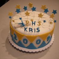 001.jpg Graduation cake. 10" Chocolate covered with fondant.