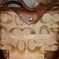 Coach Purse Cake this was my first coach cake.. it was dark choc n coconut sponge with a raspberry buttercream filling..the 2 went very well together..what...