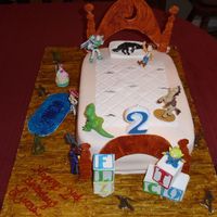 Toystory-Andy's Bedroom Made Andy's bed. Inspired by a scene in Toy Story. Made the head board and blocks from gumpaste and the wood floor stamped with an...