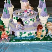 Princess Castle 4Th Birthday Buttercream icing, strawberry & vanilla cake. Everything is 100 % edible on cake. Was a big hit at the party!
