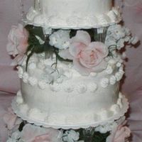 Jeanette's Wedding Cake is a rich yellow cake made the day before it was decorated with buttercream frosting.