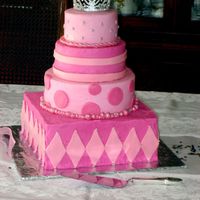 Tiered Pink Girl Birthday Cake for my daughters 2yr bday party. i cheated on the tiara and just put a plastic on up there! bottom square tier is a foam dummy. that was a...